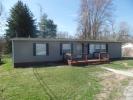 MANUFACTURED HOME ON.7 ACRES